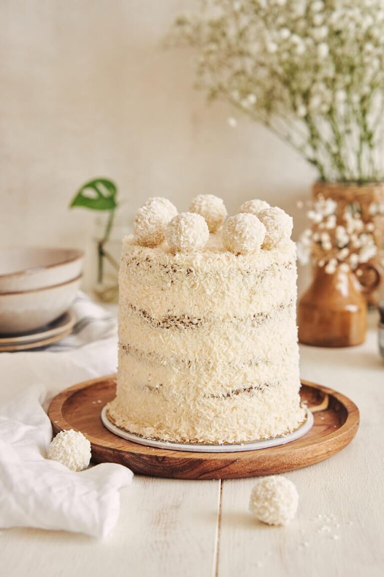 lovely-birthday-cake-with-coconut-flakes-and-balls-2025-02-02-13-47-08-utc